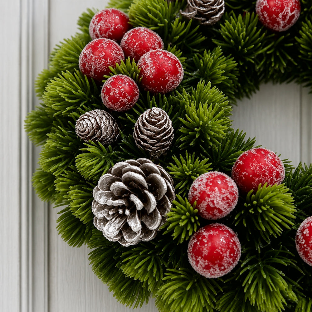 Christmas Wreath with Red Berries, Pine Cones and Bow
