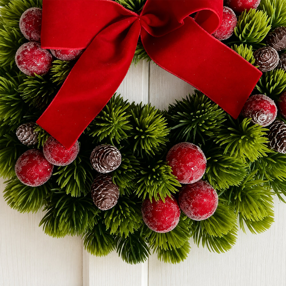 Christmas Wreath with Red Berries, Pine Cones and Bow