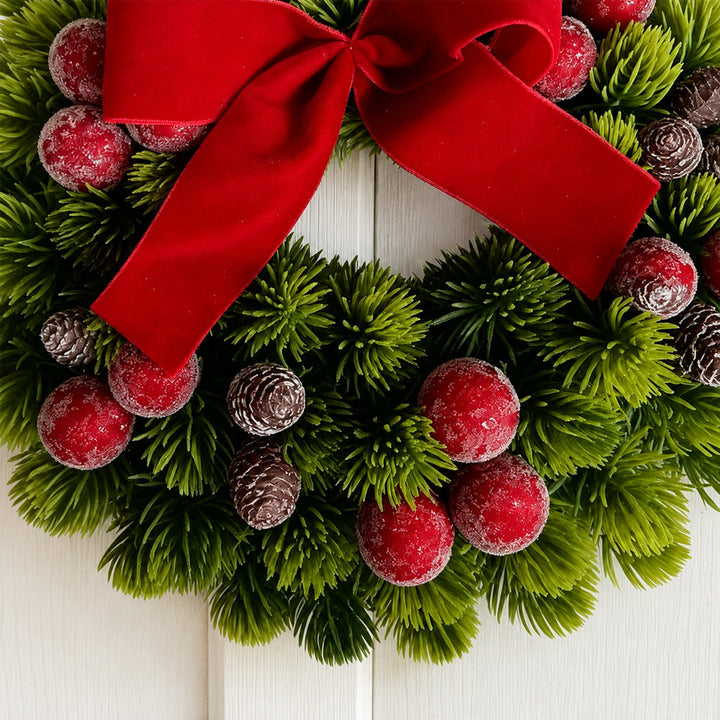 Christmas Wreath with Red Berries, Pine Cones and Bow