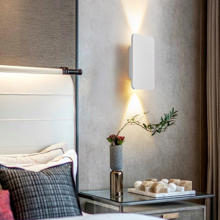 Flush Mount Bi-Directional LED Wall Sconce in Brushed Metal