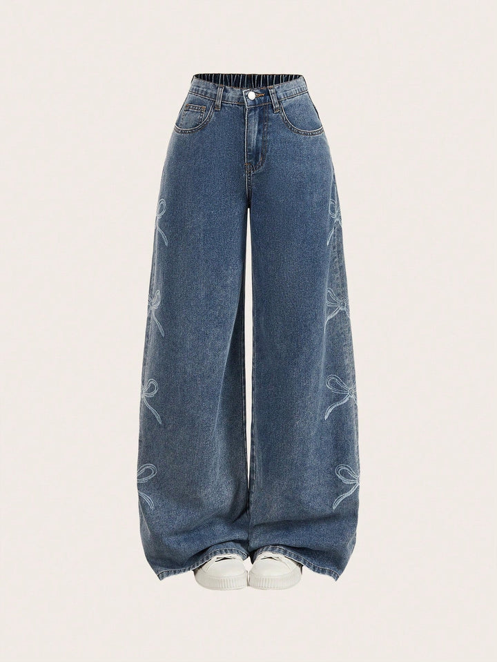 Loose-Fit Blue Denim Jeans with Distressed Detailing