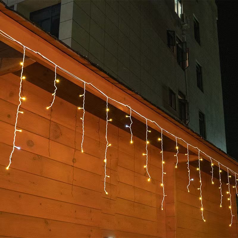 Niki | Quntis 50m LED Icicle Light String | IP44 Weatherproof | 36V Low Voltage | 500+ LEDs | Icicle Waterfall Effect | Warm White