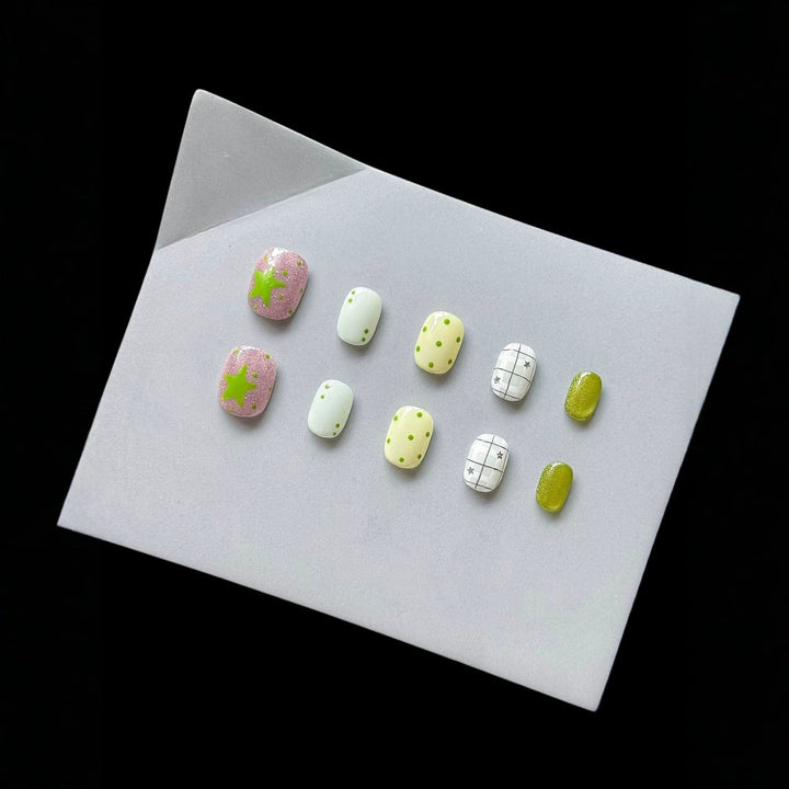 Press-On Nail Art Set with Patterns and Glitter Accents