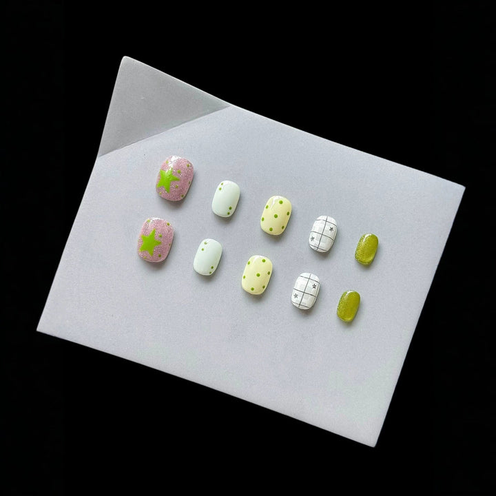Press-On Nail Art Set with Patterns and Glitter Accents