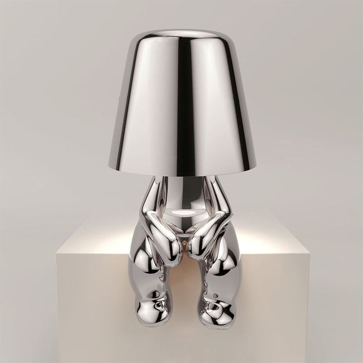 Table lamp with timeless design and gentle light emission