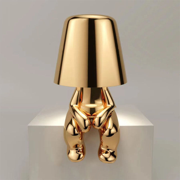 Table lamp with timeless design and gentle light emission